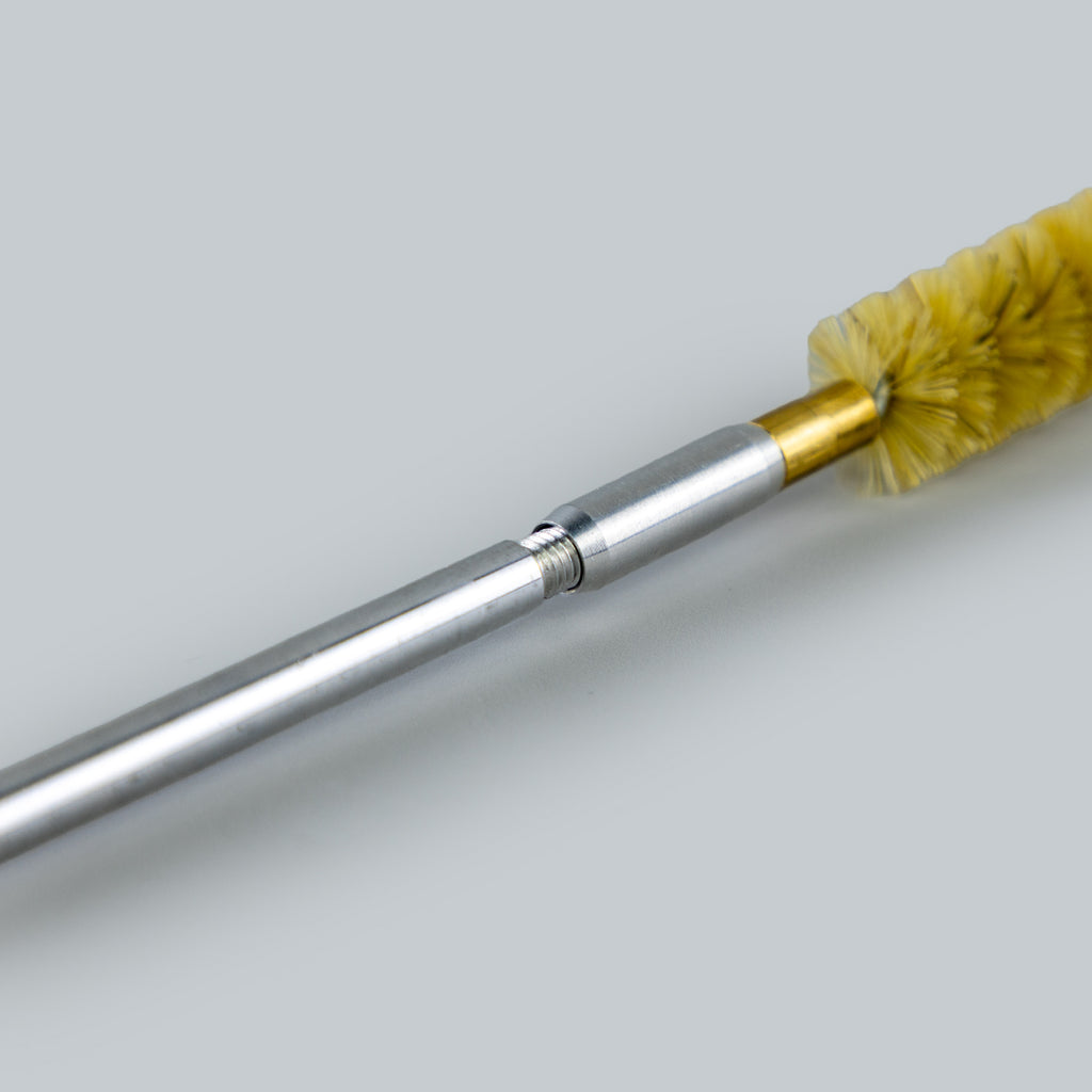 aluminium rod connected to brush head