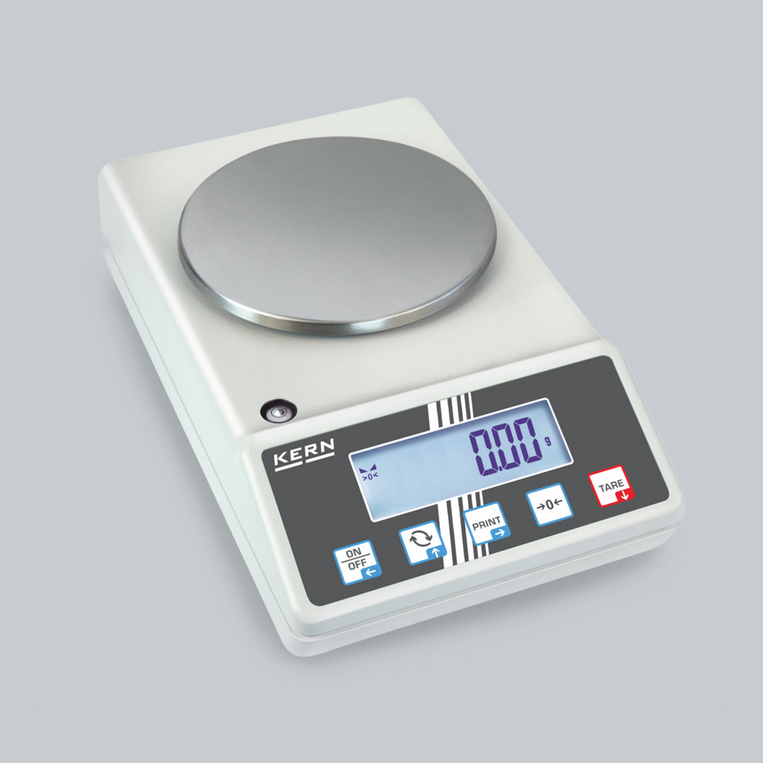 Digital scale with a white base and silver platform on a gray background